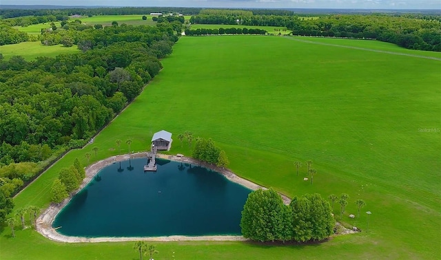 aerial view with a rural view and a water view