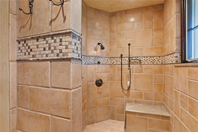 bathroom featuring tiled shower