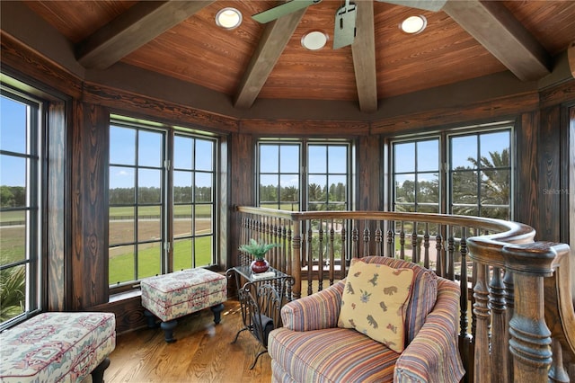 sunroom with beam ceiling and wood ceiling