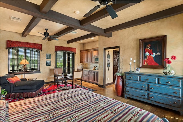 bedroom with ceiling fan, dark hardwood / wood-style floors, beamed ceiling, and coffered ceiling