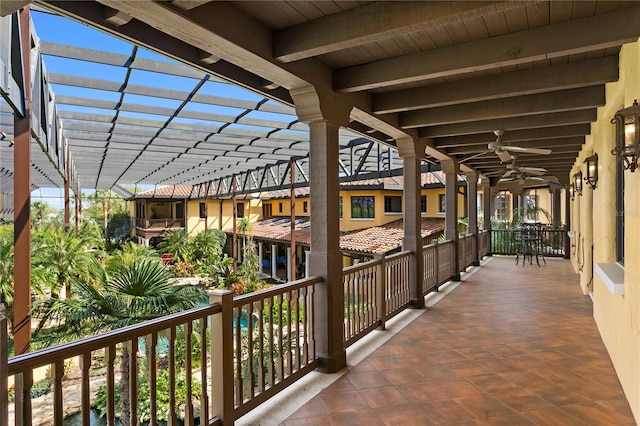 view of patio featuring ceiling fan