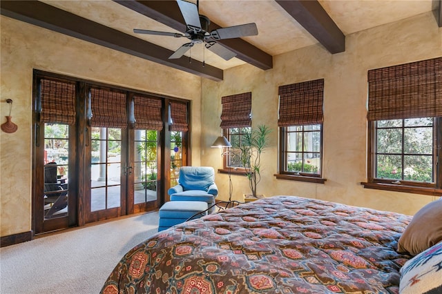 bedroom with french doors, access to exterior, carpet flooring, ceiling fan, and beam ceiling