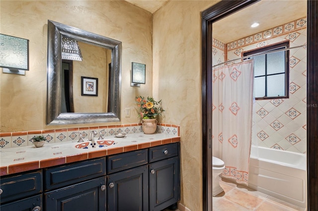 full bathroom with toilet, vanity, and shower / bathtub combination with curtain