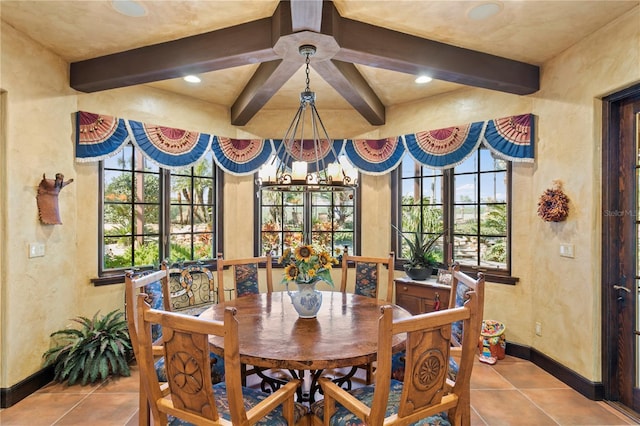 dining area featuring light tile patterned flooring, a wealth of natural light, beam ceiling, and a chandelier