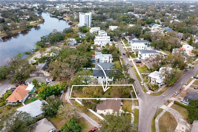 aerial view featuring a residential view and a water view