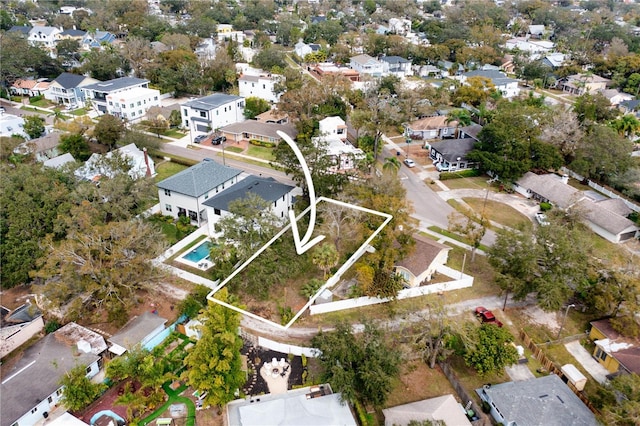 birds eye view of property with a residential view