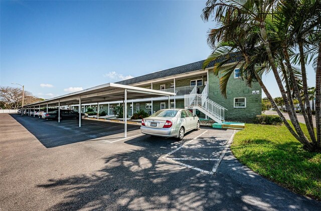 view of parking featuring a carport