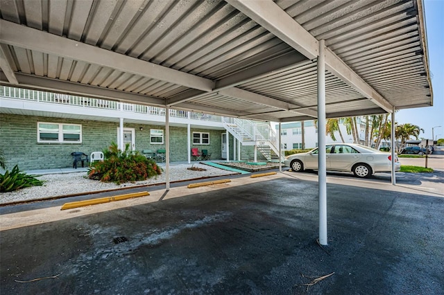 view of parking with a carport