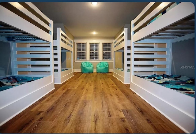 bedroom featuring wood-type flooring