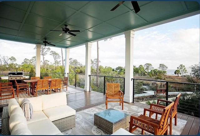 sunroom / solarium with ceiling fan