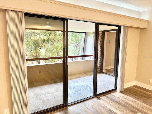 doorway featuring light hardwood / wood-style floors