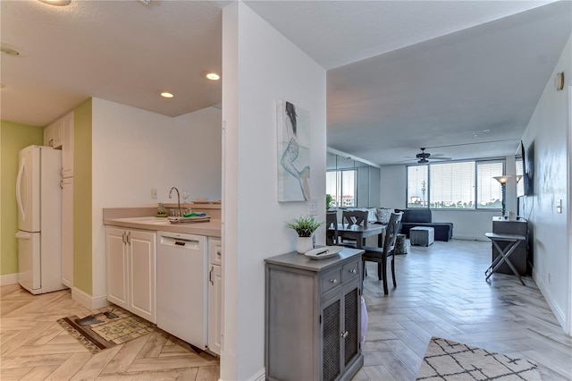 interior space with light parquet flooring and sink