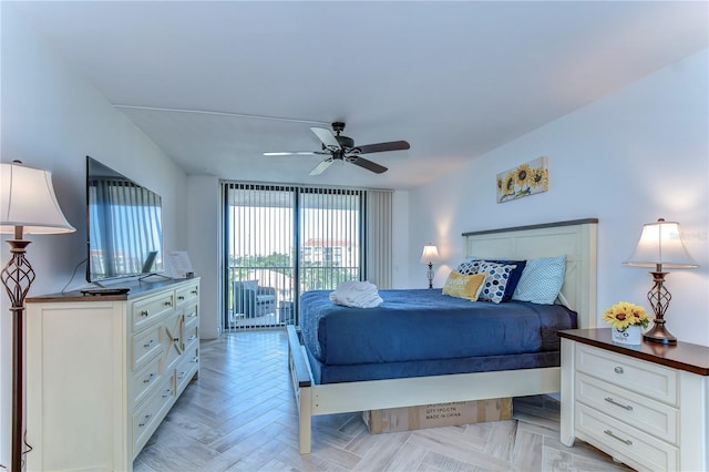 bedroom with light parquet flooring, access to exterior, and ceiling fan