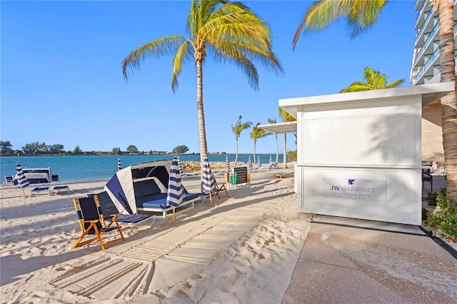 view of patio with a water view