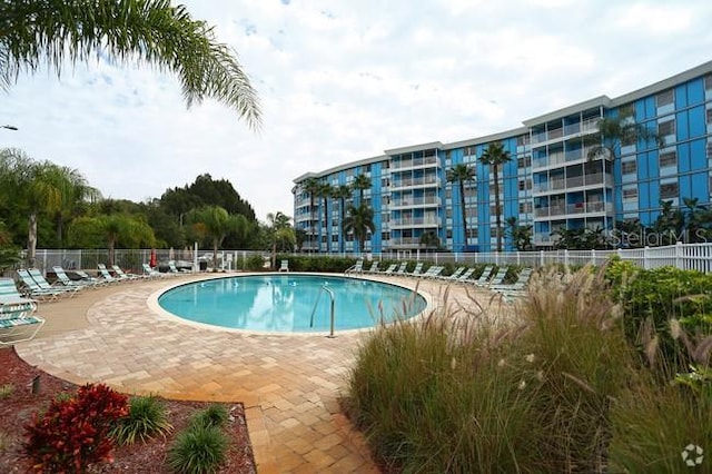 view of swimming pool featuring a patio