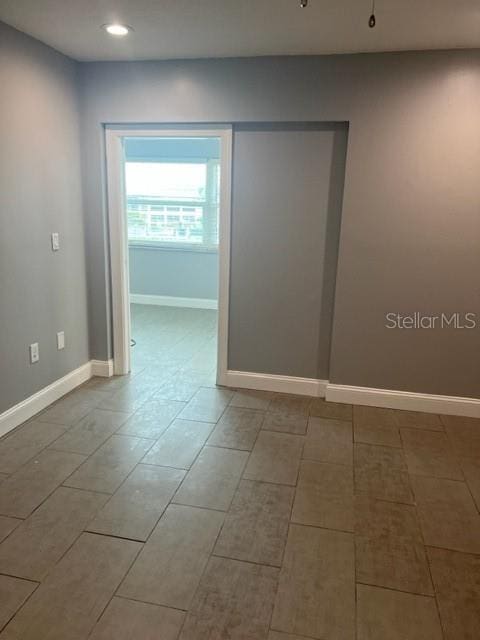 empty room with tile flooring