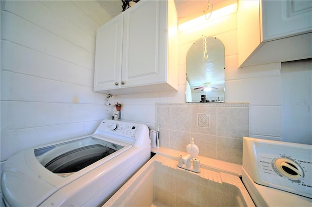 washroom with cabinets, washer / clothes dryer, and ceiling fan