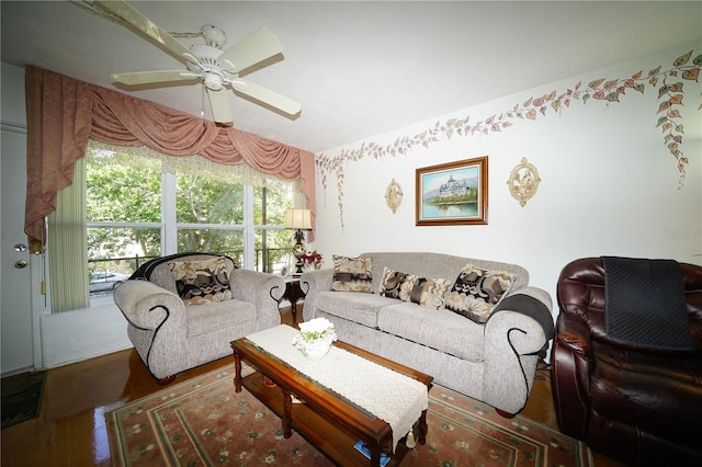 living area featuring ceiling fan