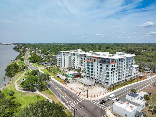 birds eye view of property featuring a water view