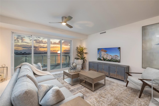 living room with ceiling fan