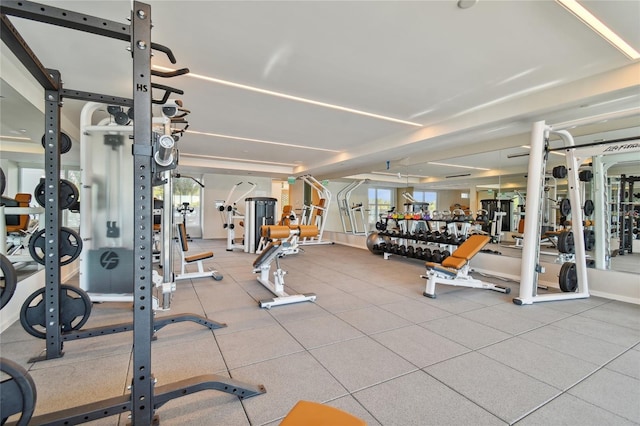 workout area with light tile floors