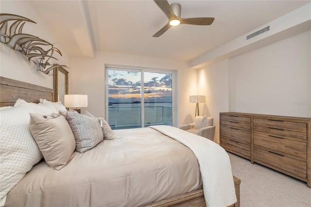 carpeted bedroom with access to exterior and ceiling fan