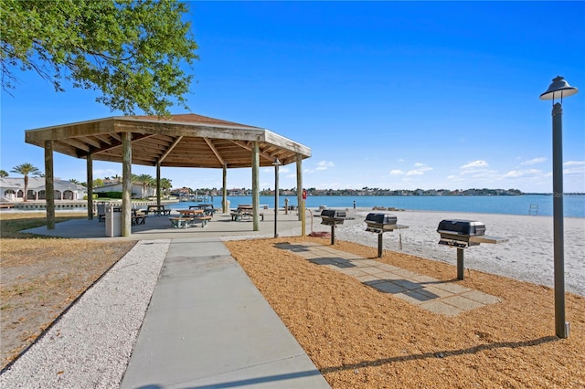 view of property's community featuring a gazebo and a water view