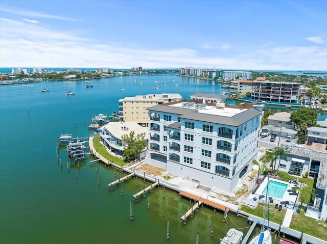 birds eye view of property featuring a water view