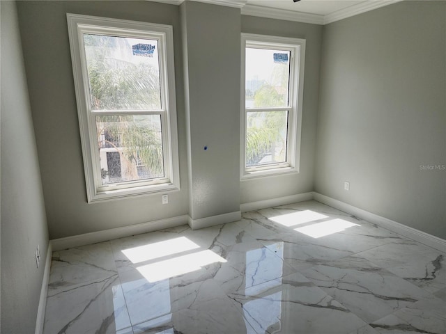 empty room featuring ornamental molding