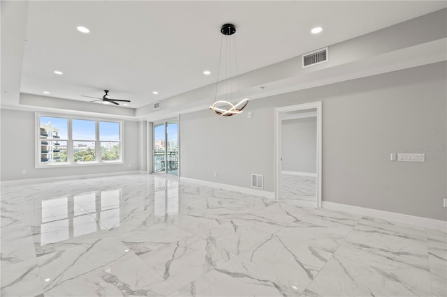 unfurnished room featuring ceiling fan