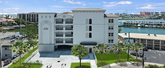 view of building exterior with a water view