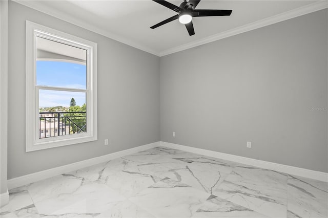 empty room featuring ornamental molding and ceiling fan