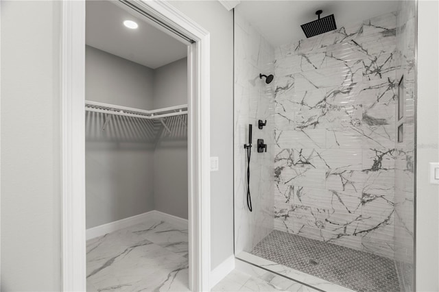 bathroom with a tile shower