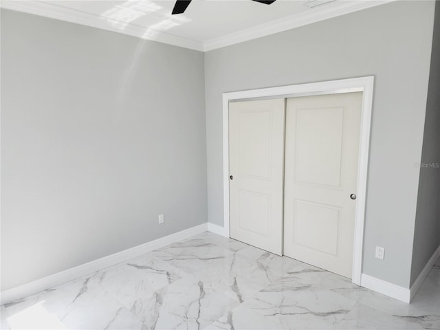 unfurnished bedroom featuring ornamental molding, a closet, and ceiling fan