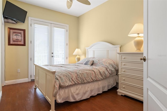 bedroom featuring access to outside, ceiling fan, and dark hardwood / wood-style floors