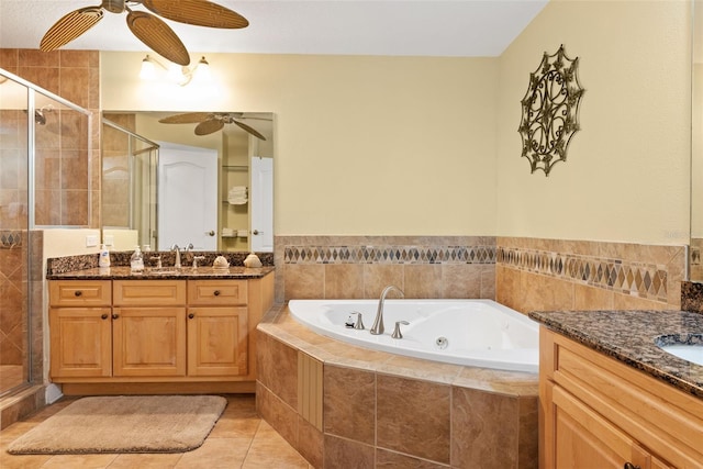 bathroom with vanity, tile flooring, ceiling fan, and shower with separate bathtub