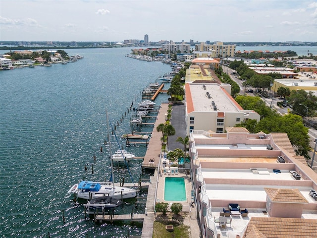 birds eye view of property featuring a water view