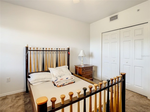 carpeted bedroom with a closet