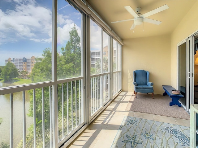 sunroom / solarium with ceiling fan