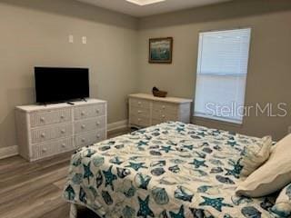 bedroom featuring hardwood / wood-style floors