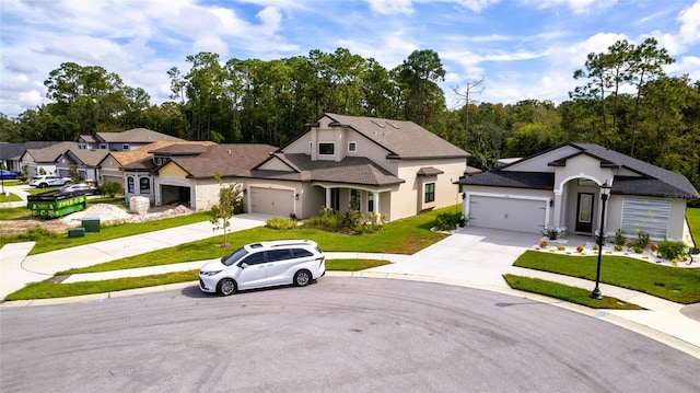 view of front of house with a front lawn and a garage