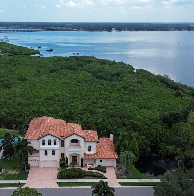 birds eye view of property featuring a water view