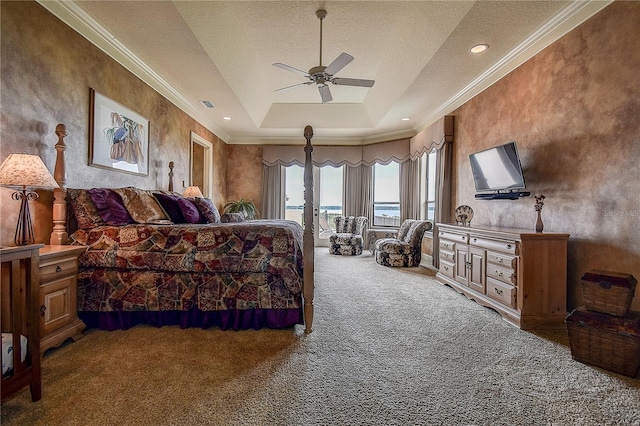 bedroom featuring carpet flooring, access to outside, ceiling fan, a raised ceiling, and a textured ceiling