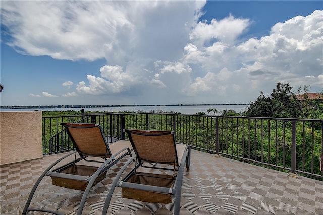 view of patio / terrace with a water view