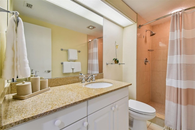 bathroom with vanity, tile flooring, curtained shower, and toilet