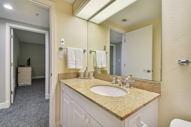 bathroom featuring oversized vanity