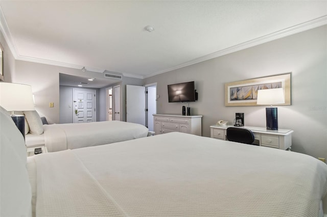 bedroom with ornamental molding