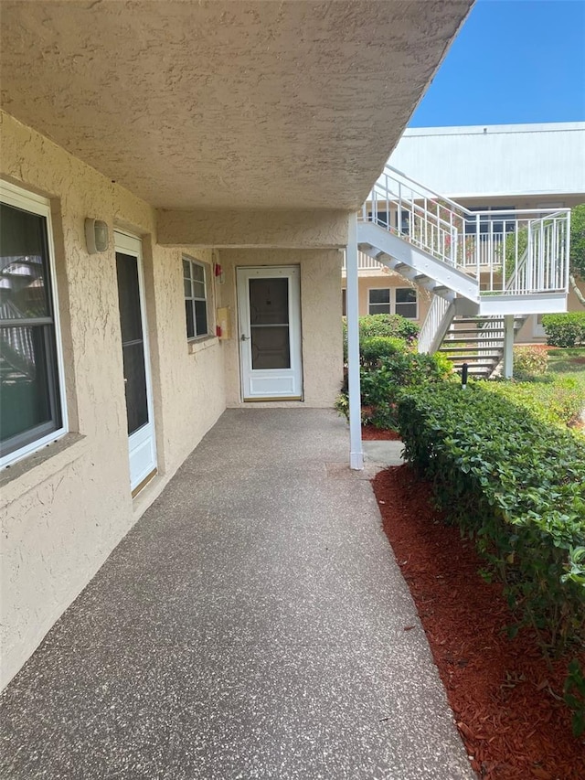 view of patio / terrace featuring stairway