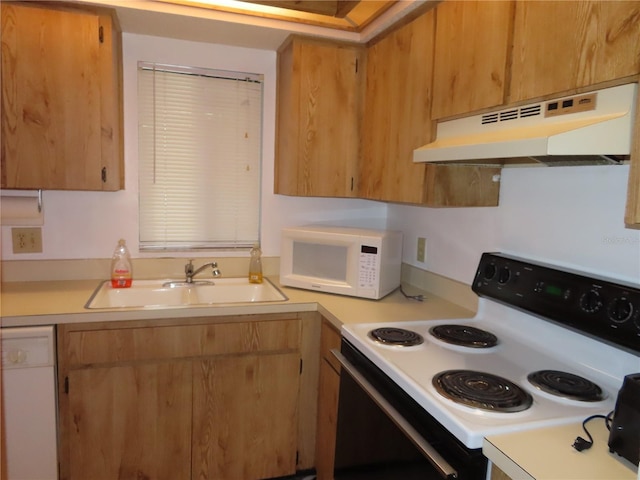 kitchen with white appliances and sink