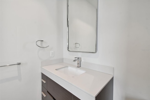 bathroom featuring oversized vanity